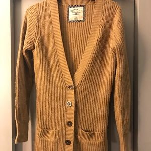 Women’s button up cardigan.